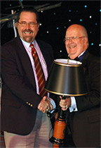 Calvin Banyan being presented the Charles Tebbits Award by Dr. Dwight Damon, August 2005, NGH Convention.